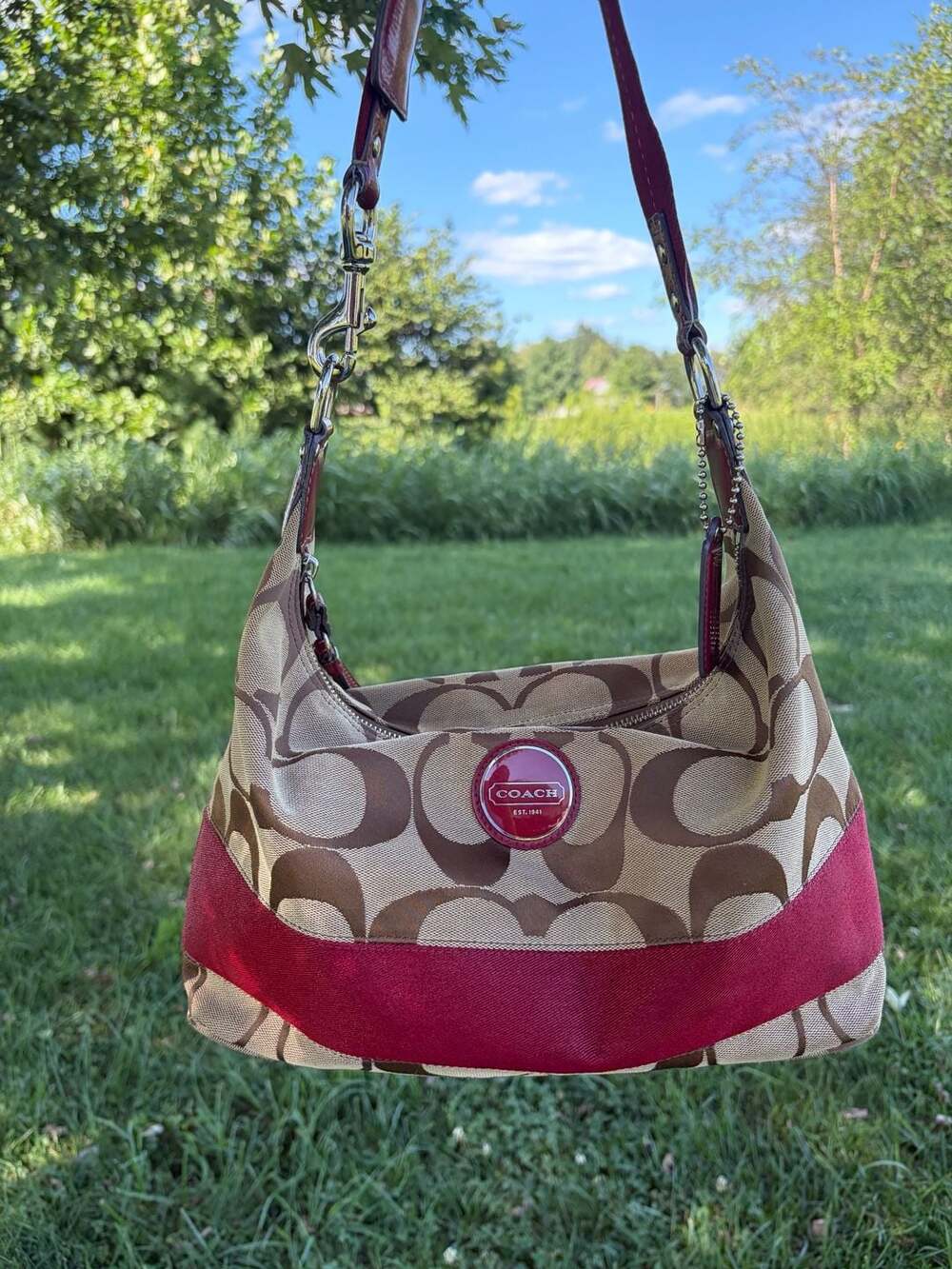 Coach signature stripe hobo bag in burgundy
